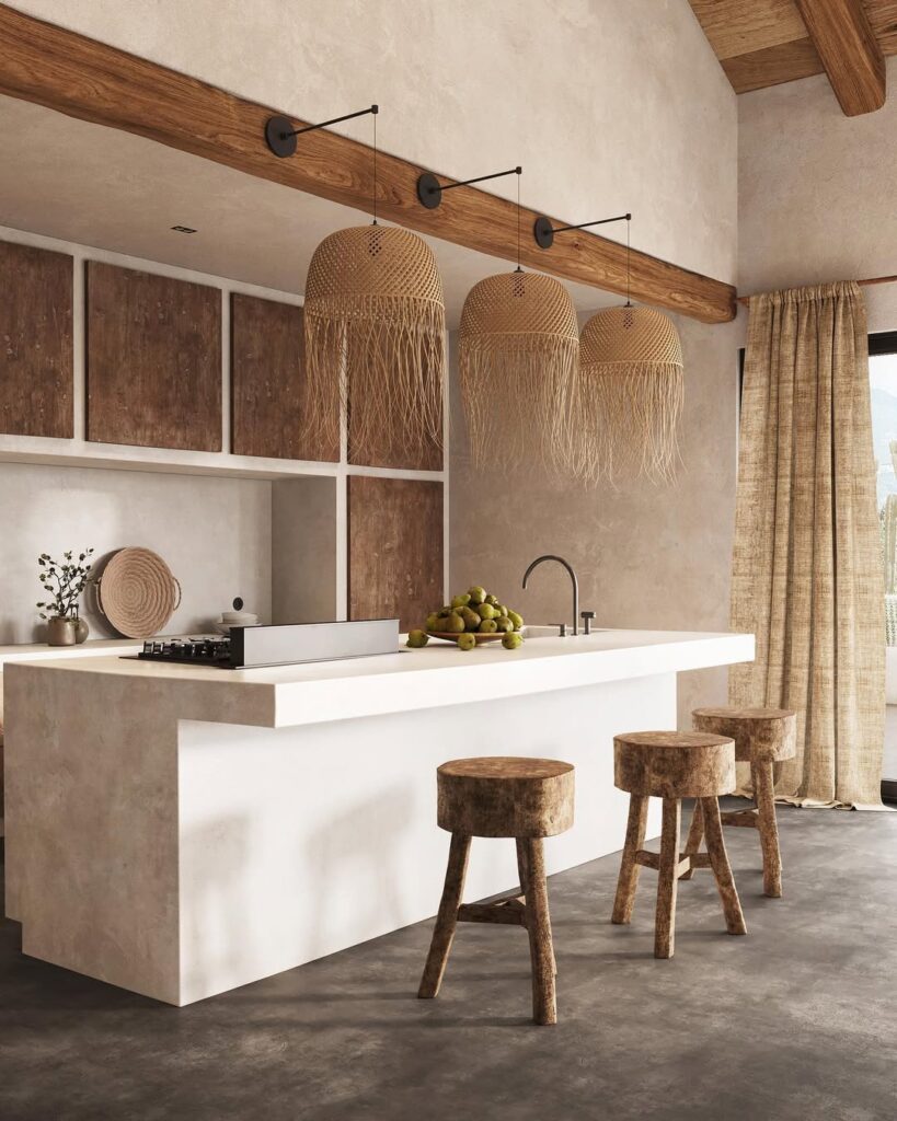 White kitchen island with woven pendant lights and wooden stools