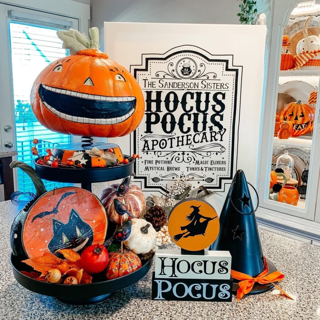 Halloween themed display with animated pumpkin head and witch apothecary sign