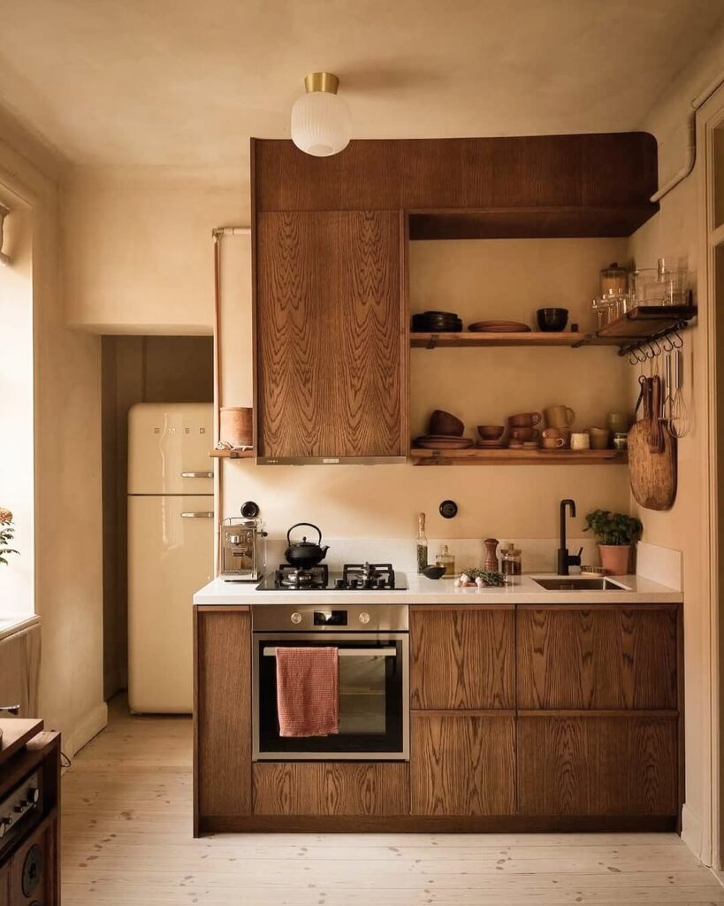 Compact wooden kitchen with retro appliances and open shelving