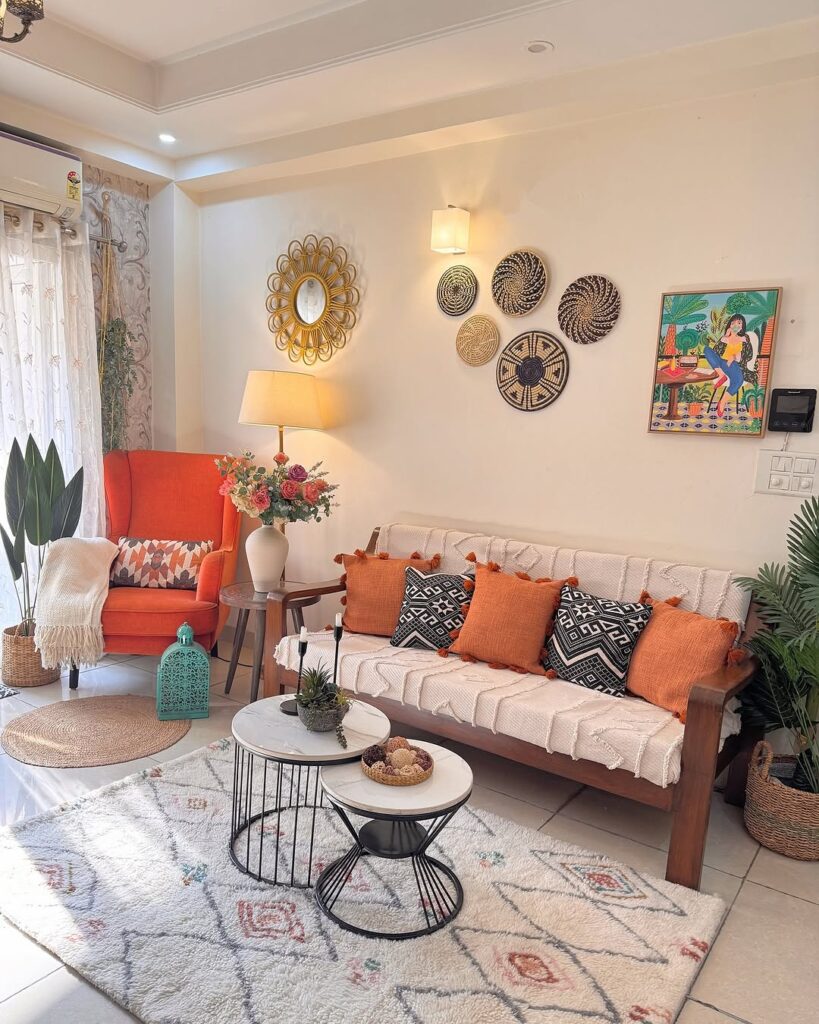 Living room with orange chair woven wall decor and modern furniture