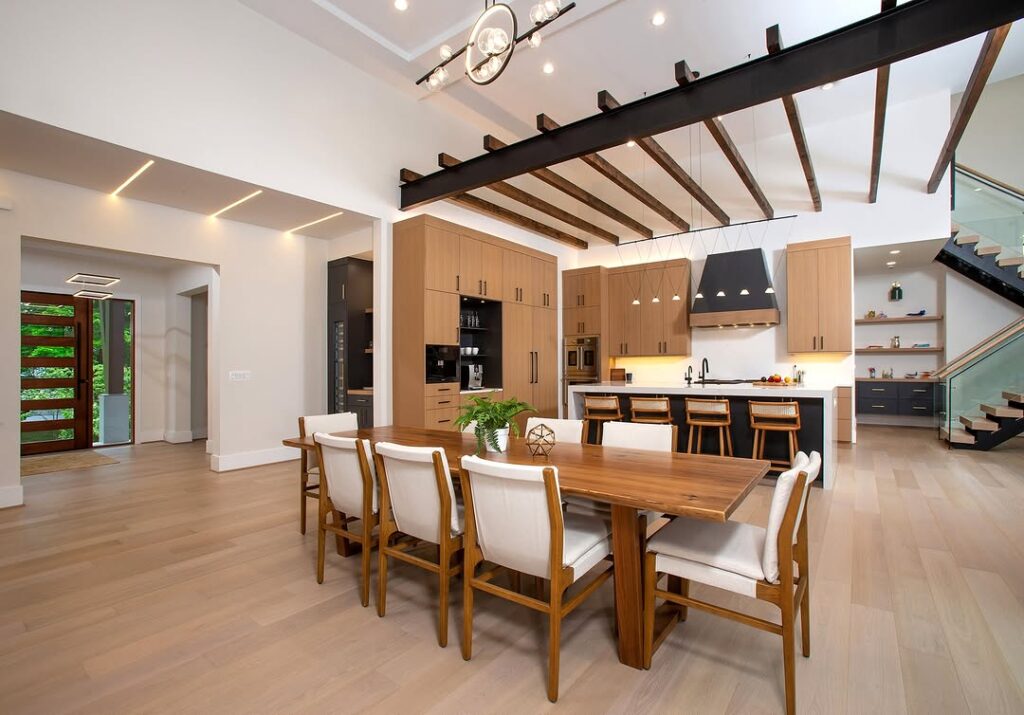 Modern kitchen with oak cabinets and exposed beams