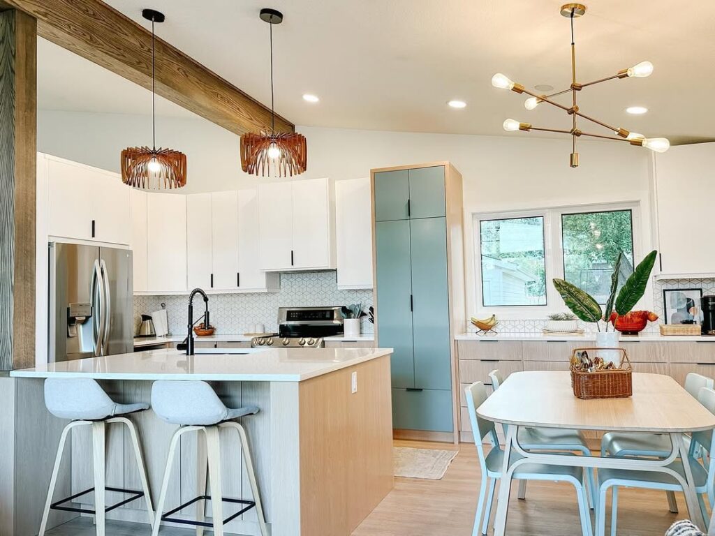  Bright kitchen with wooden accents and mint colored pantry