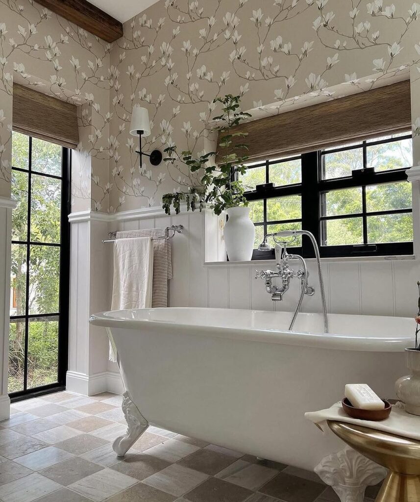 Modern bathroom with magnolia wallpaper and black framed windows