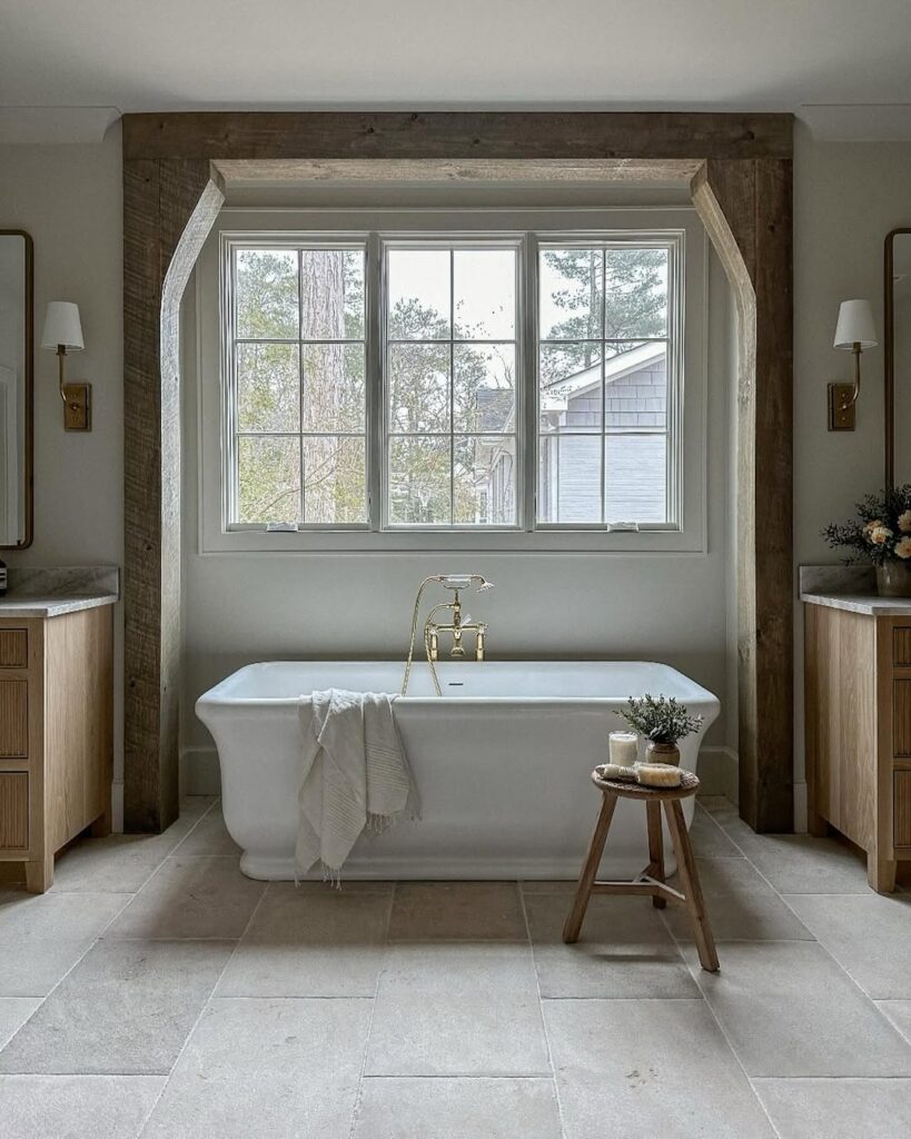 Bathroom with wooden beams and centered soaking tub