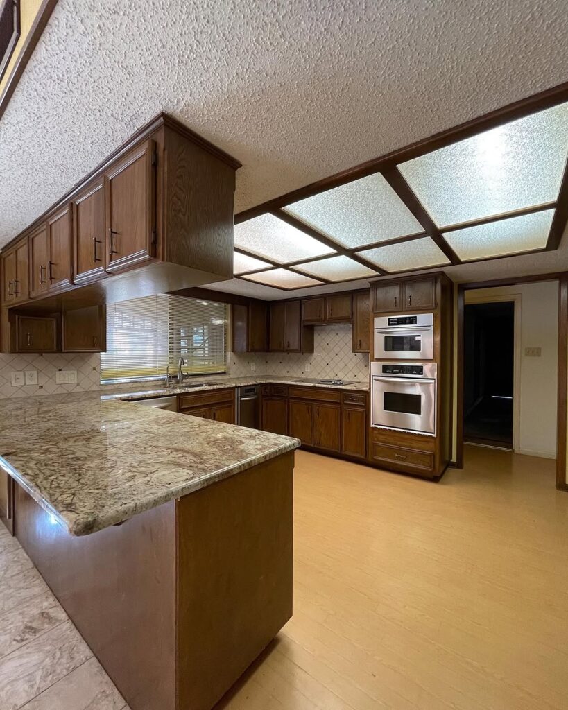 Traditional kitchen with oak cabinets and illuminated ceiling panels